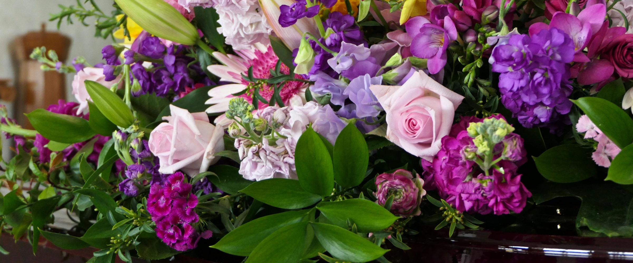 Bunch of Funeral Flowers on a Casket