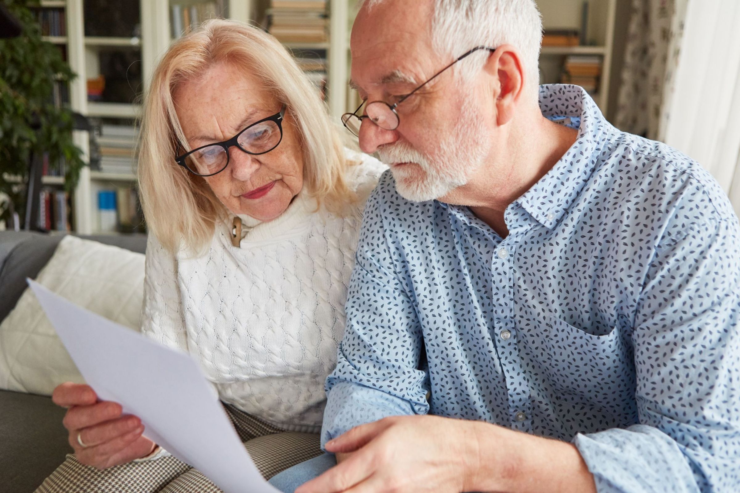 Senior Couple Reading a Funeral Plan